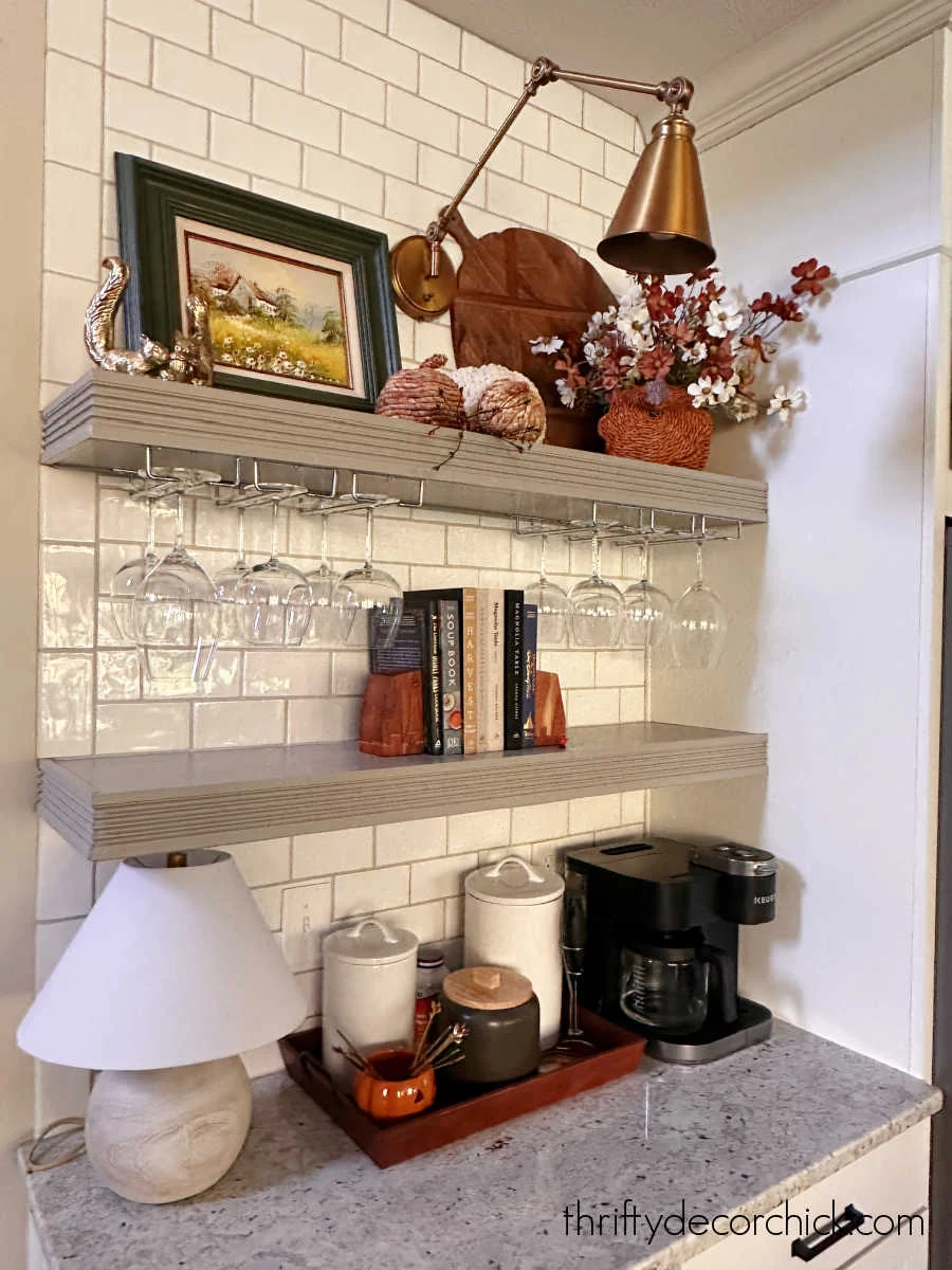 floating shelves with wine glass storage
