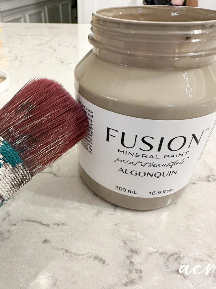 paint a wood look finish 5 algonquin and paint brush on counter