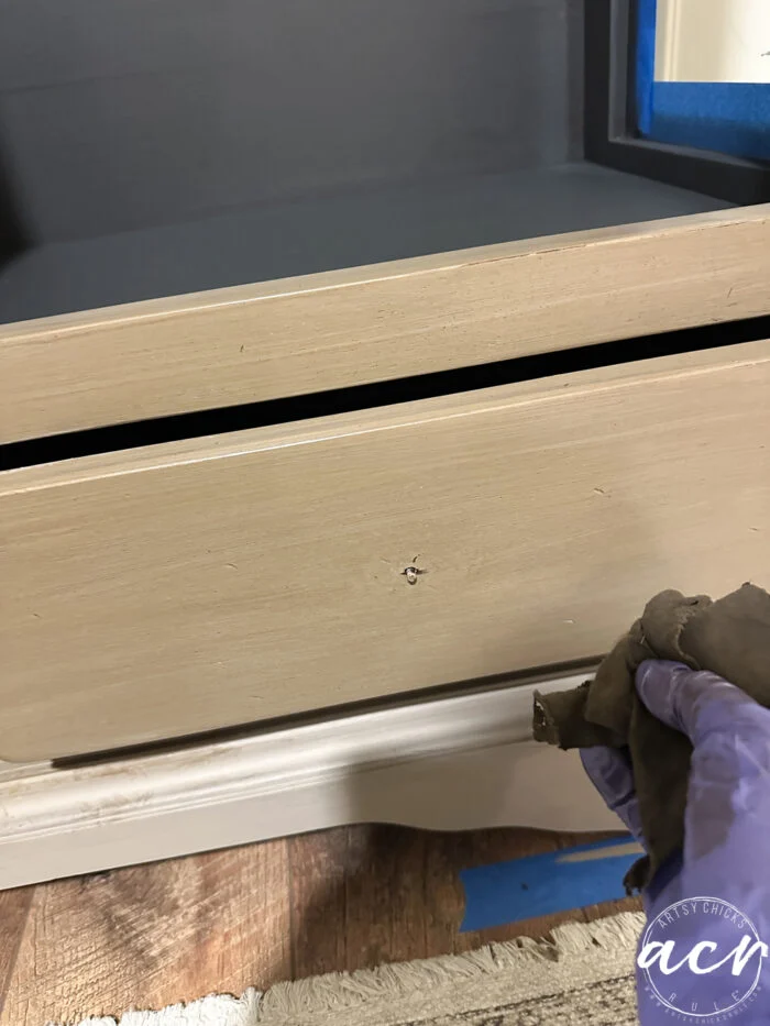 paint a wood look finish 13 wiping stain in long strokes to mimic wood