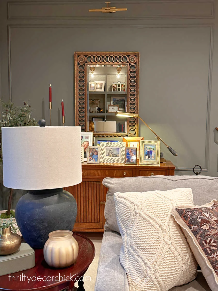 rearranging our basement family room prep for the holidays thrifty decor chick 5 various framed photos on dresser