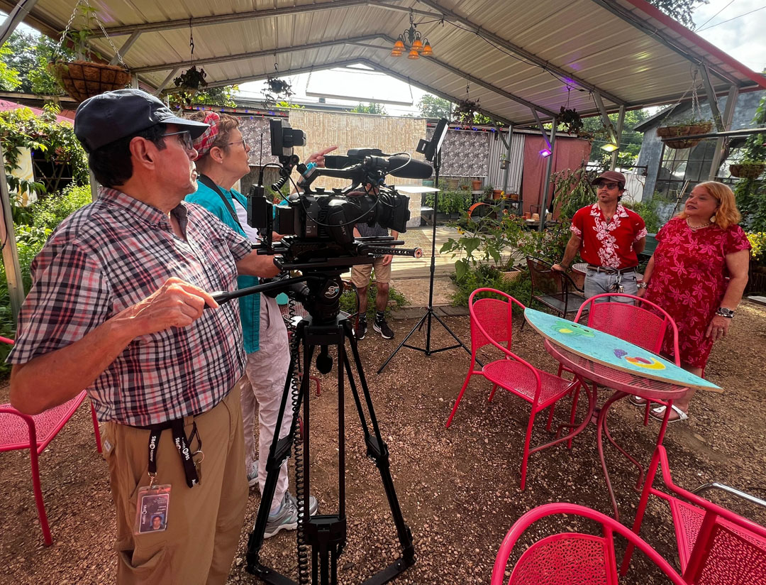 30 seasons and countless memories 41 man behind video camera with woman next to him; interviewing alex and bonnie at vortex gardens