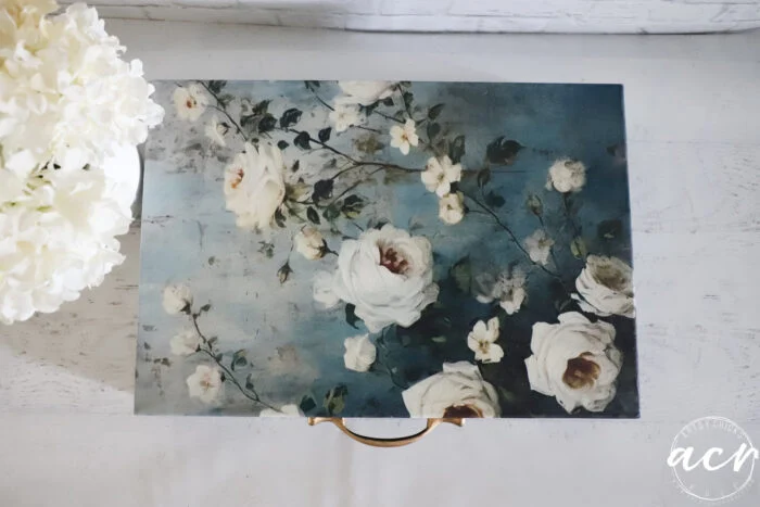 top view of blue box with white roses