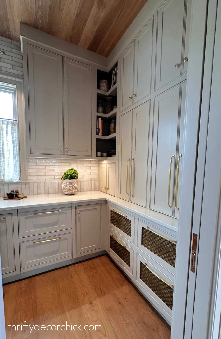 pantry with metal front drawers