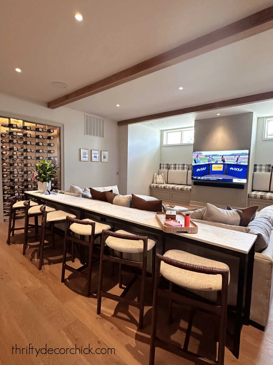 long table with stools behind sectional