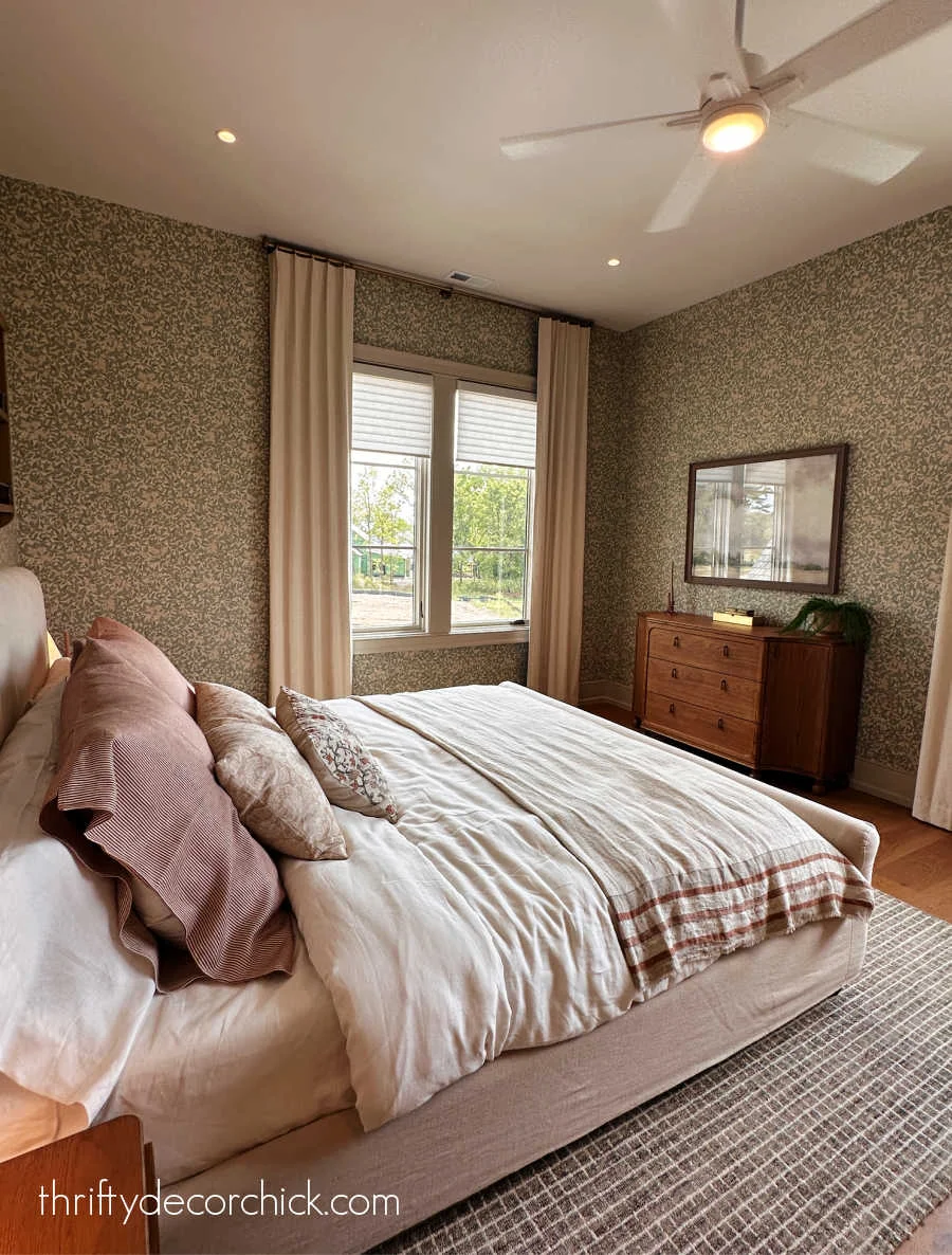 bedroom with green and pink floral wallpaper