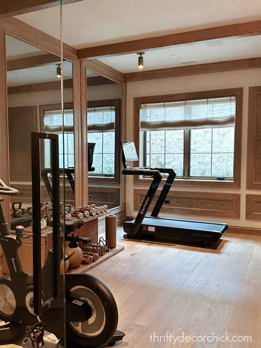 home gym with wood stained molding