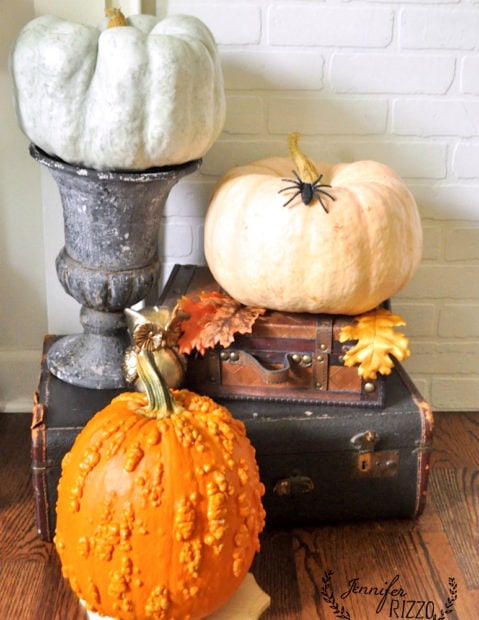 halloween mantel decor with pumpkins, spiders and more 9 mulit colored pumpkin trio on vintage and new suitcases and halloween decor