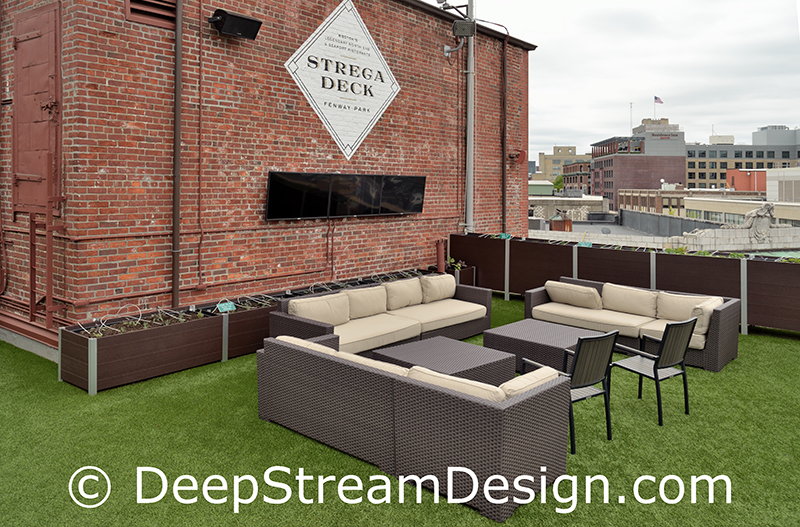 large rectangular planters growing produce on fenway stadium strega deck