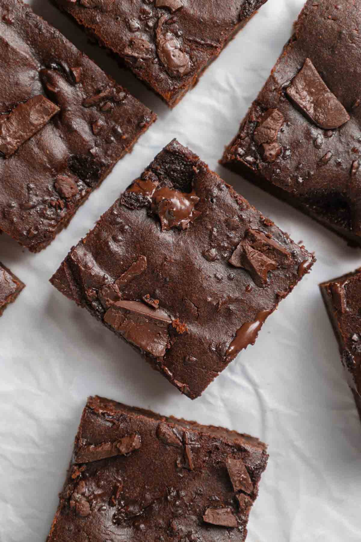 sweet potato brownies paper and stitch 8 sweet potato brownies cut into squares, ready to eat with melty chocolate