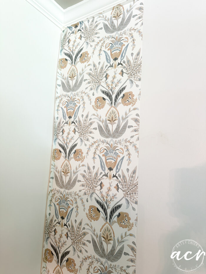 hanging prepasted strippable wallpaper artsy chicks rule 7 first piece of wallpaper is up