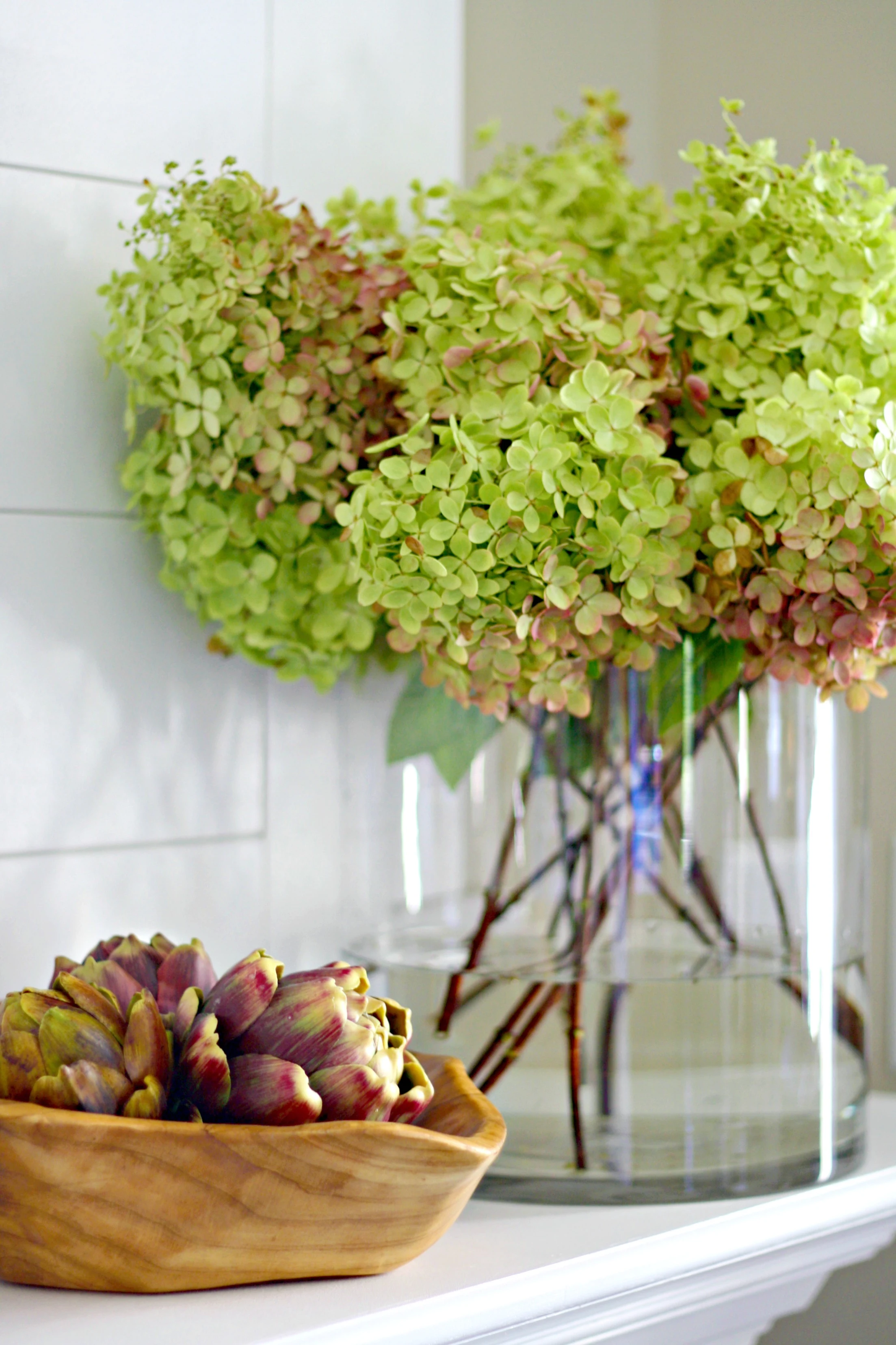 green pink hydrangeas glass vase