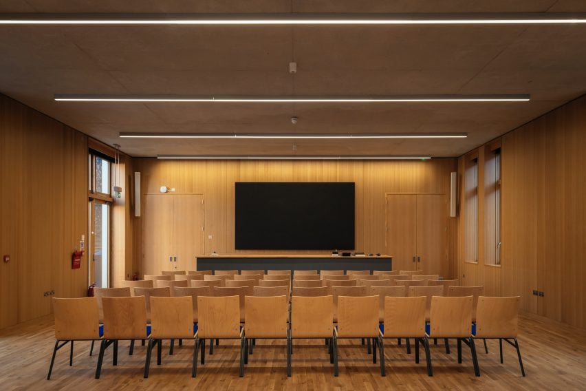 wood-lined lecture hall