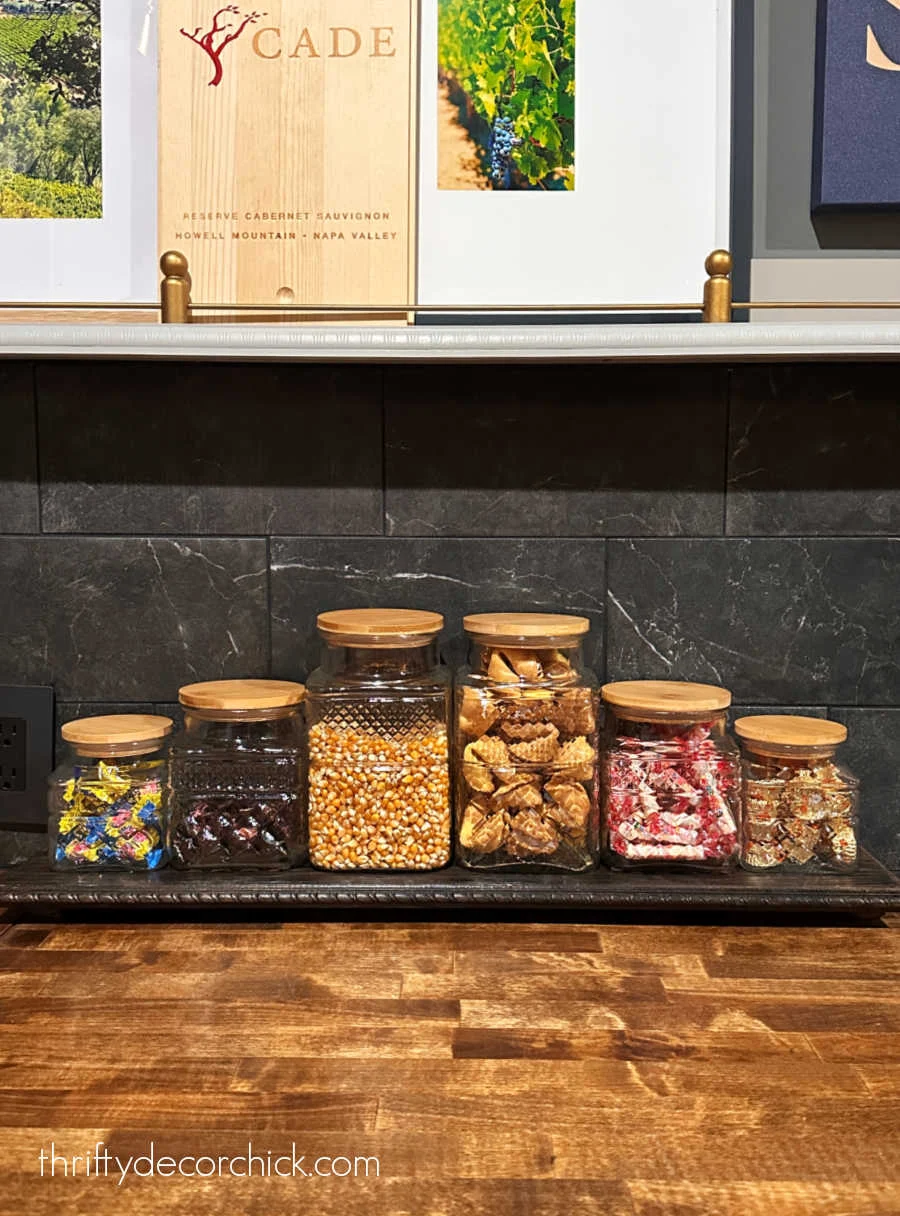 glass containers on wood riser