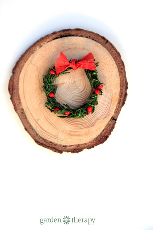 miniature wreath with raffia bow