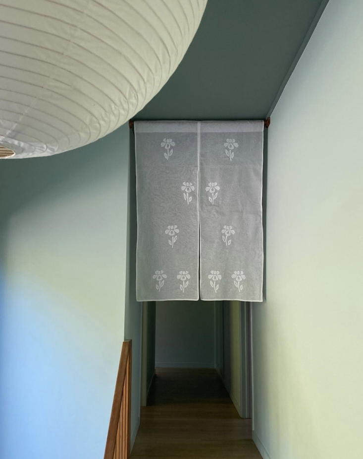 designer katie lockhart sourced this handmade noren from tokyo. 