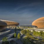 Dezeen Agenda features waterfront stadium by Zaha Hadid Architects