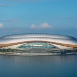 Zaha Hadid Architects completes waterfront stadium in Guangzhou
