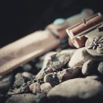 Caress clay vessels, their veins traces of rain and ruin cradled by firelight hues.