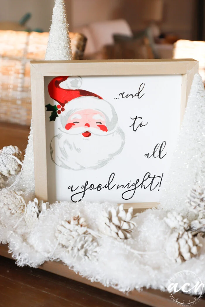 napkin decoupage ideas - artsy chicks ruleĀ® 21 a framed and to all a good night sign featuring a vintage santa illustration is surrounded by white snowy decorations, pinecones, and small white christmas trees.