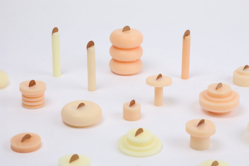 wax candles in tones of yellow, orange and white