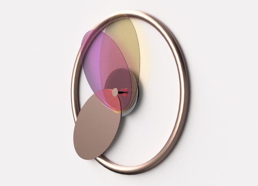 a clock with handles in tones of silver, purple and yellow