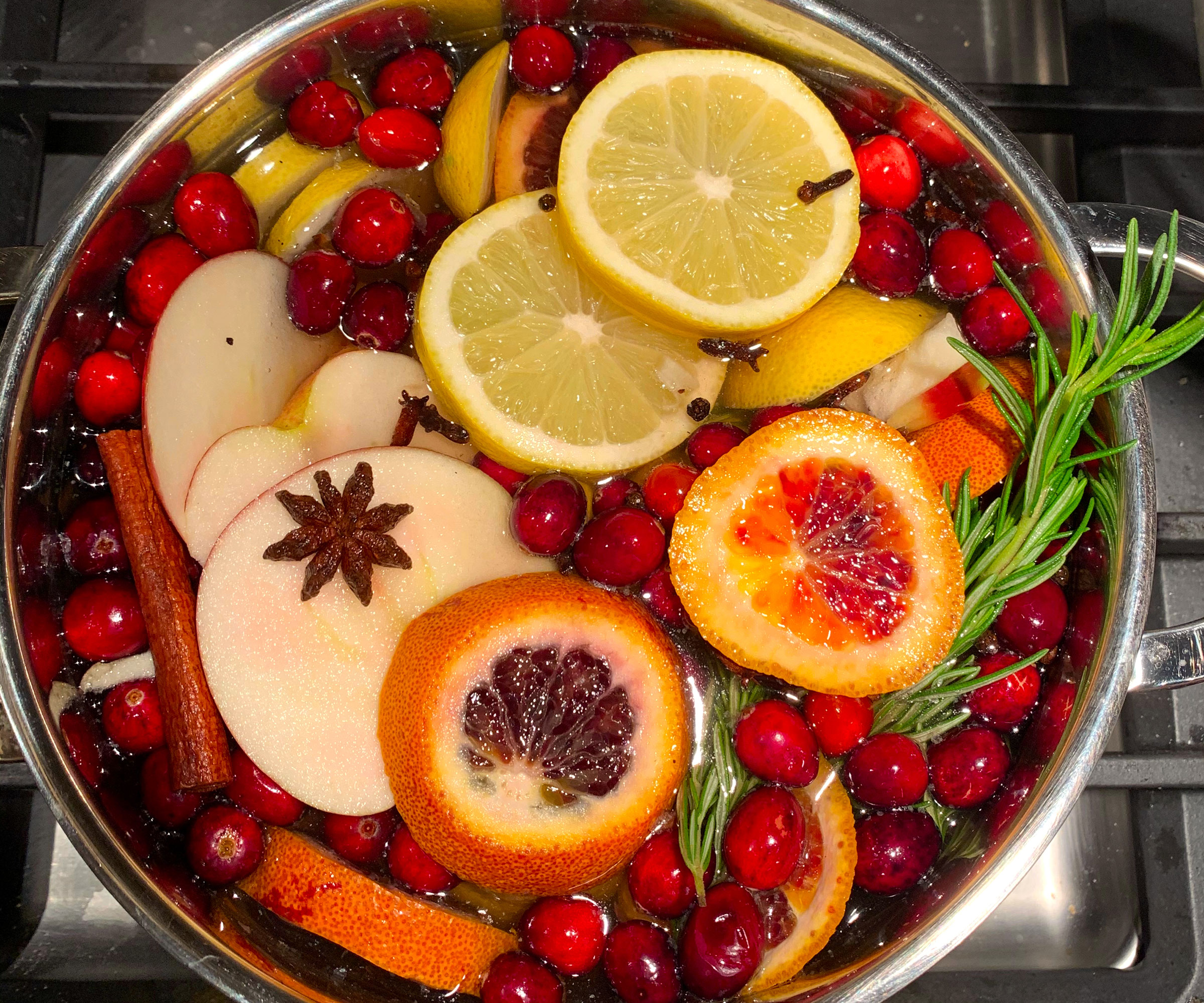 festive fragrant rosemary decor ideas for holiday cheer 4 rosemary and fruit in festive stovetop simmer