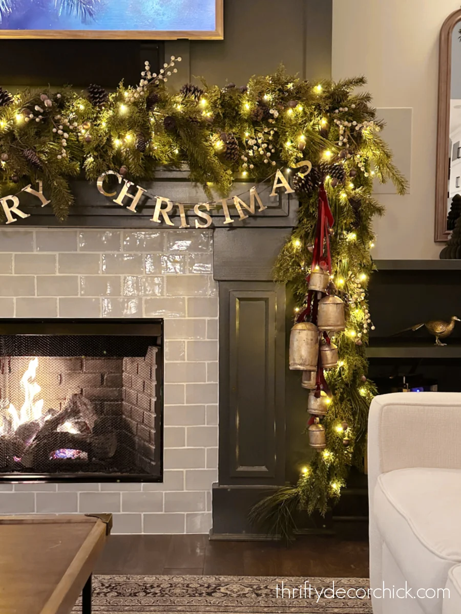 a detailed tour of the christmas decor in our great room | thrifty decor chick 36 full garland on christmas mantel