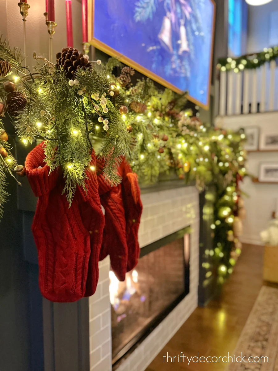 a detailed tour of the christmas decor in our great room | thrifty decor chick 37 knit stockings on christmas mantel