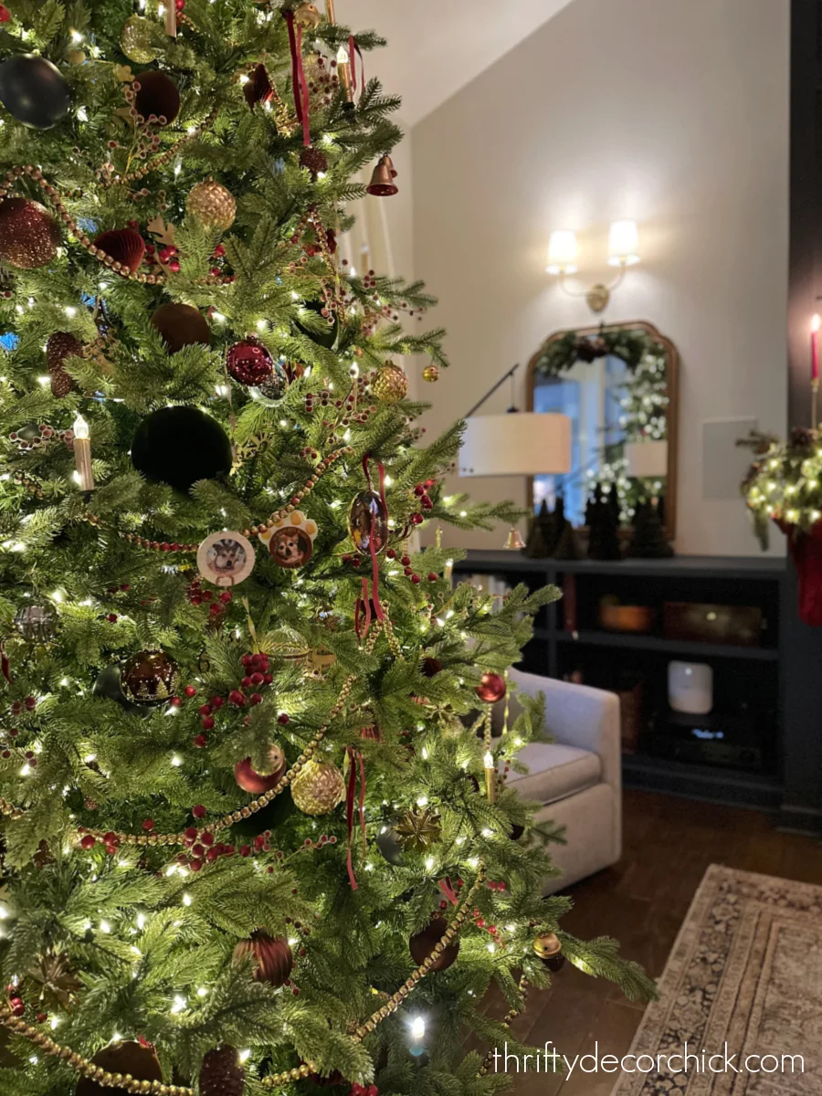 a detailed tour of the christmas decor in our great room | thrifty decor chick 40 warm jewel toned ornaments