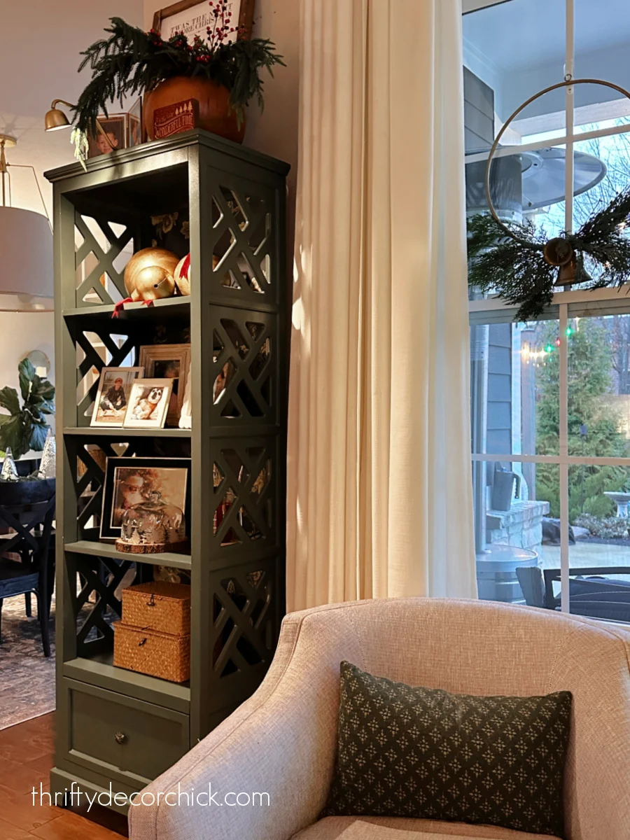 a detailed tour of the christmas decor in our great room | thrifty decor chick 42 skinny green bookcase with cut outs