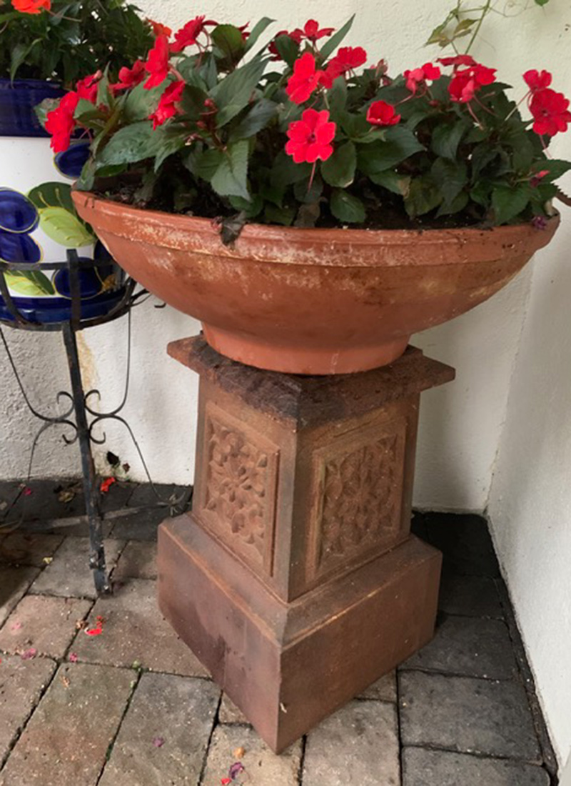 vintage terracotta bowl on plinth
