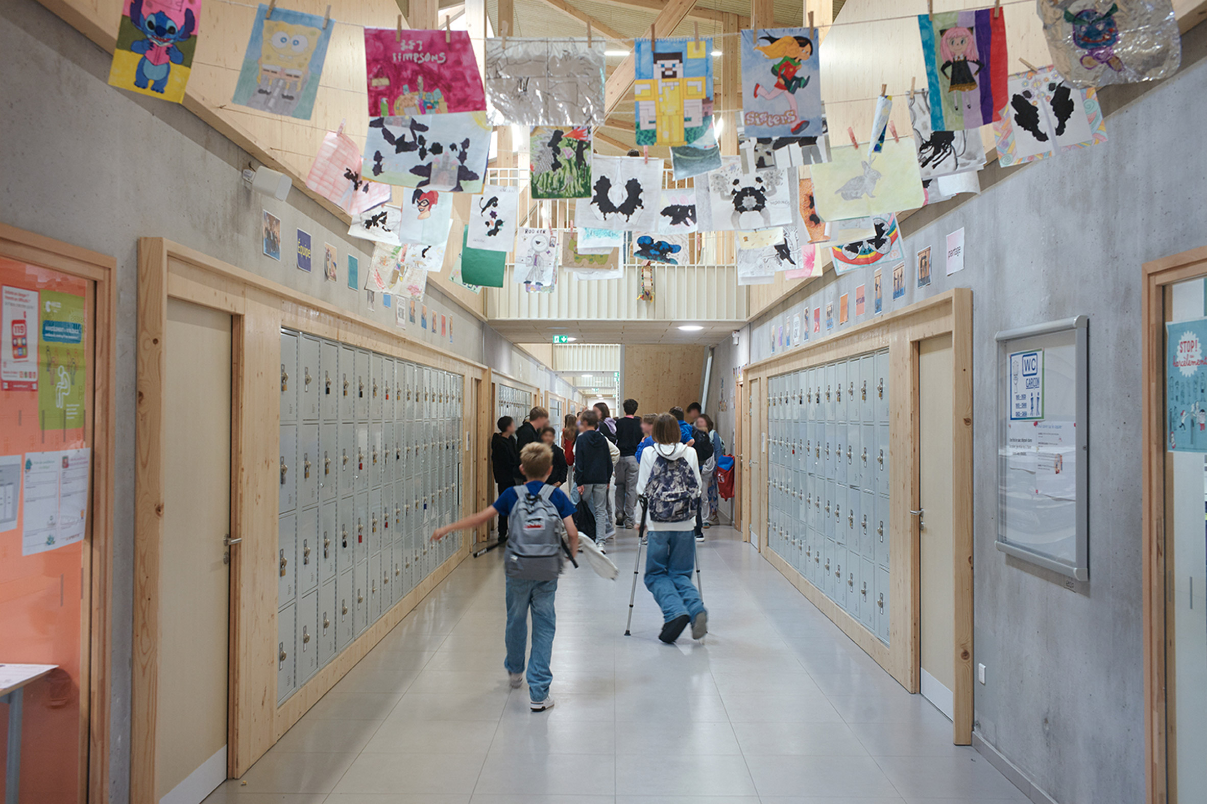 school coridoor with pictures pinned up 