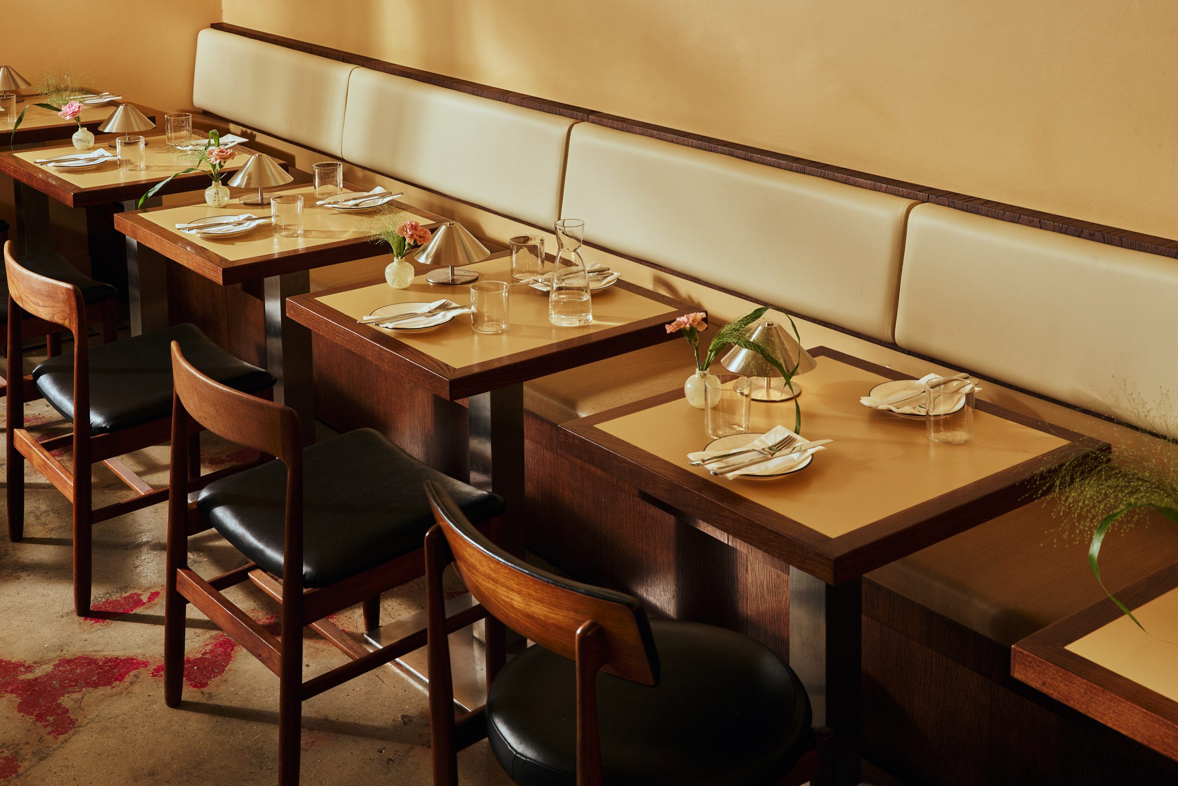 classic wooden tables at tom's pasta