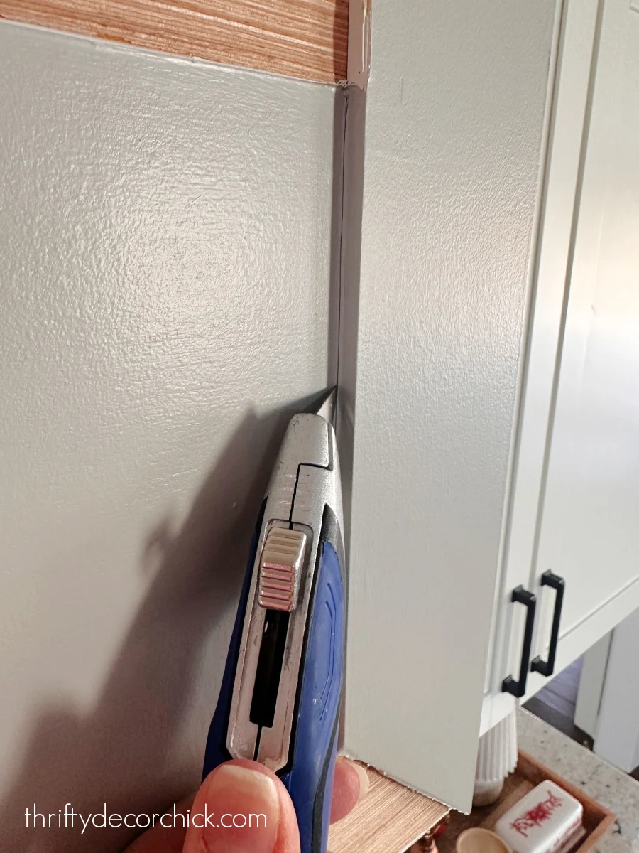 diy custom range hood with shelf and brass tipping rail | thrifty decor chick 2 scoring caulk with razor