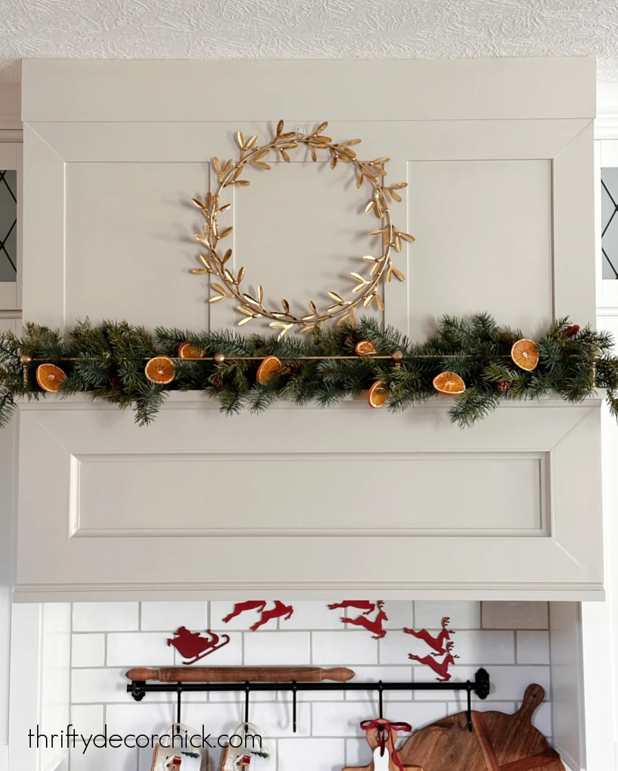 diy custom range hood with shelf and brass tipping rail | thrifty decor chick 20 wreath and garland range hood