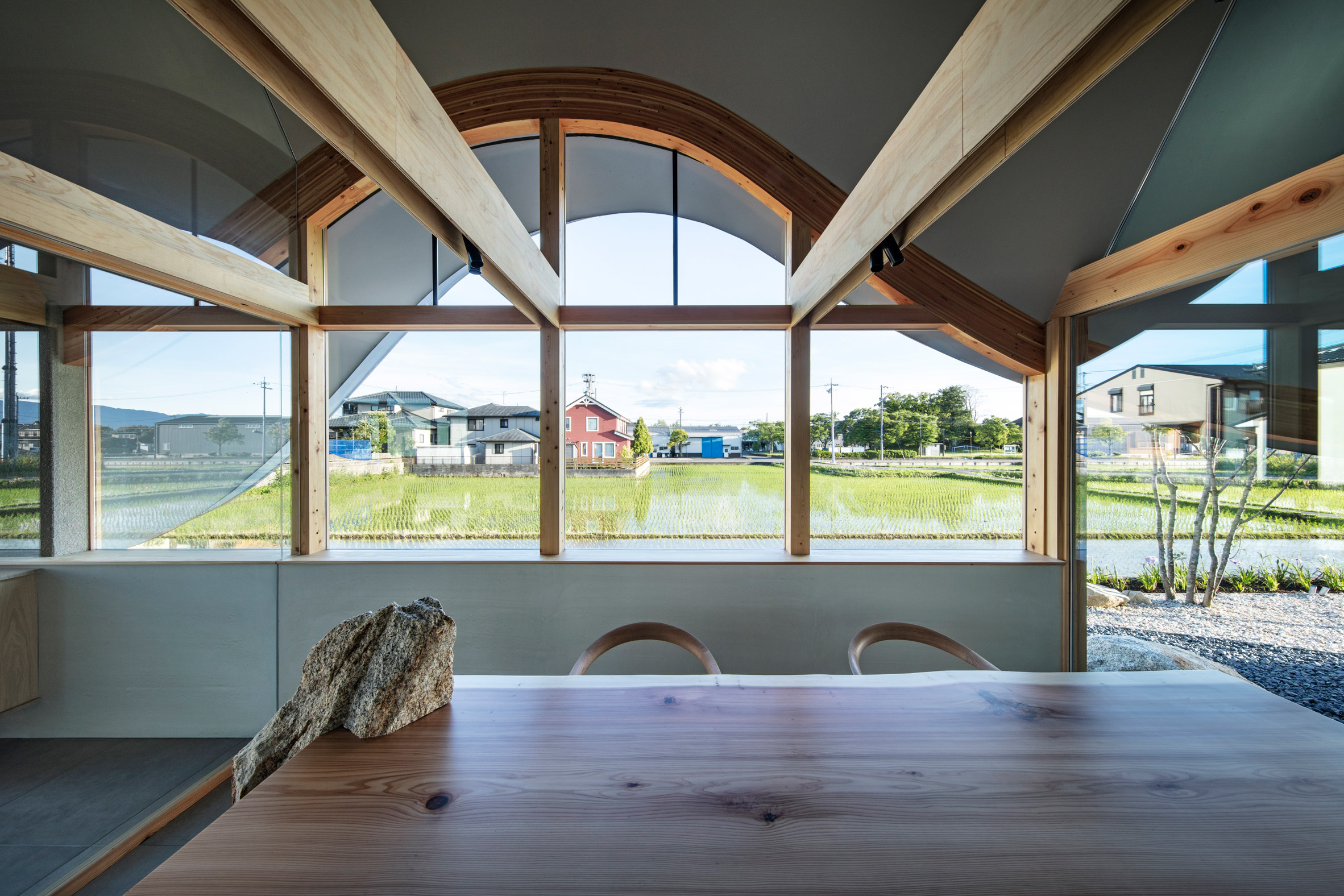 office in hashima backed by views of the surrounding landscape 