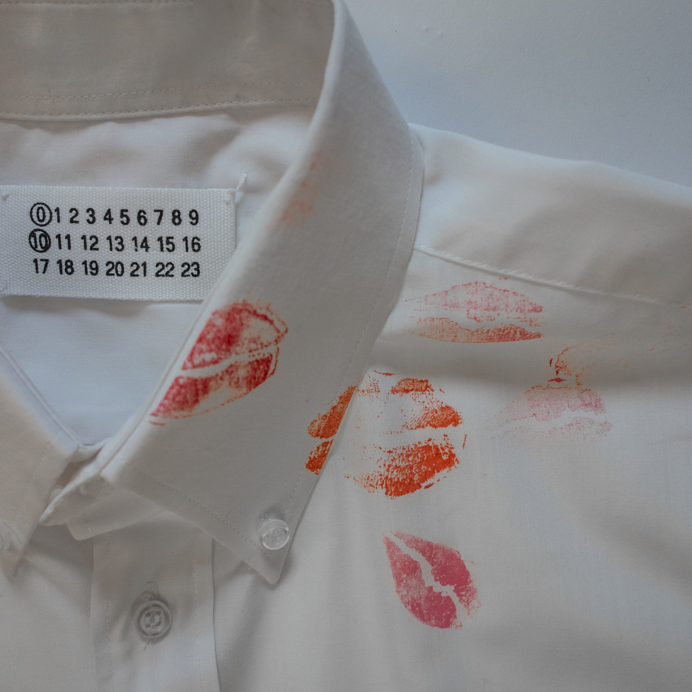 photo of white shirt with kiss marks