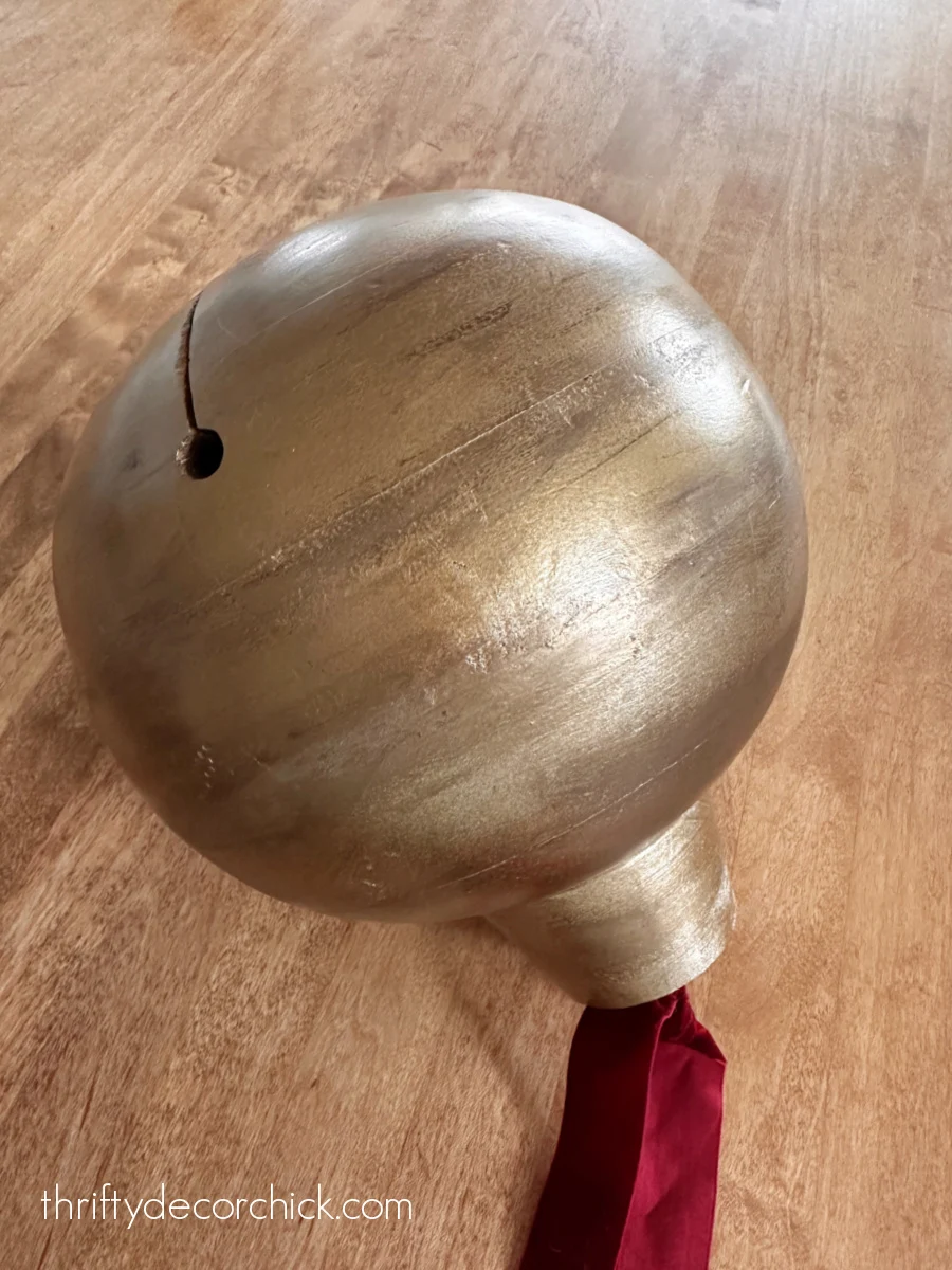 wood bell with metal spray paint