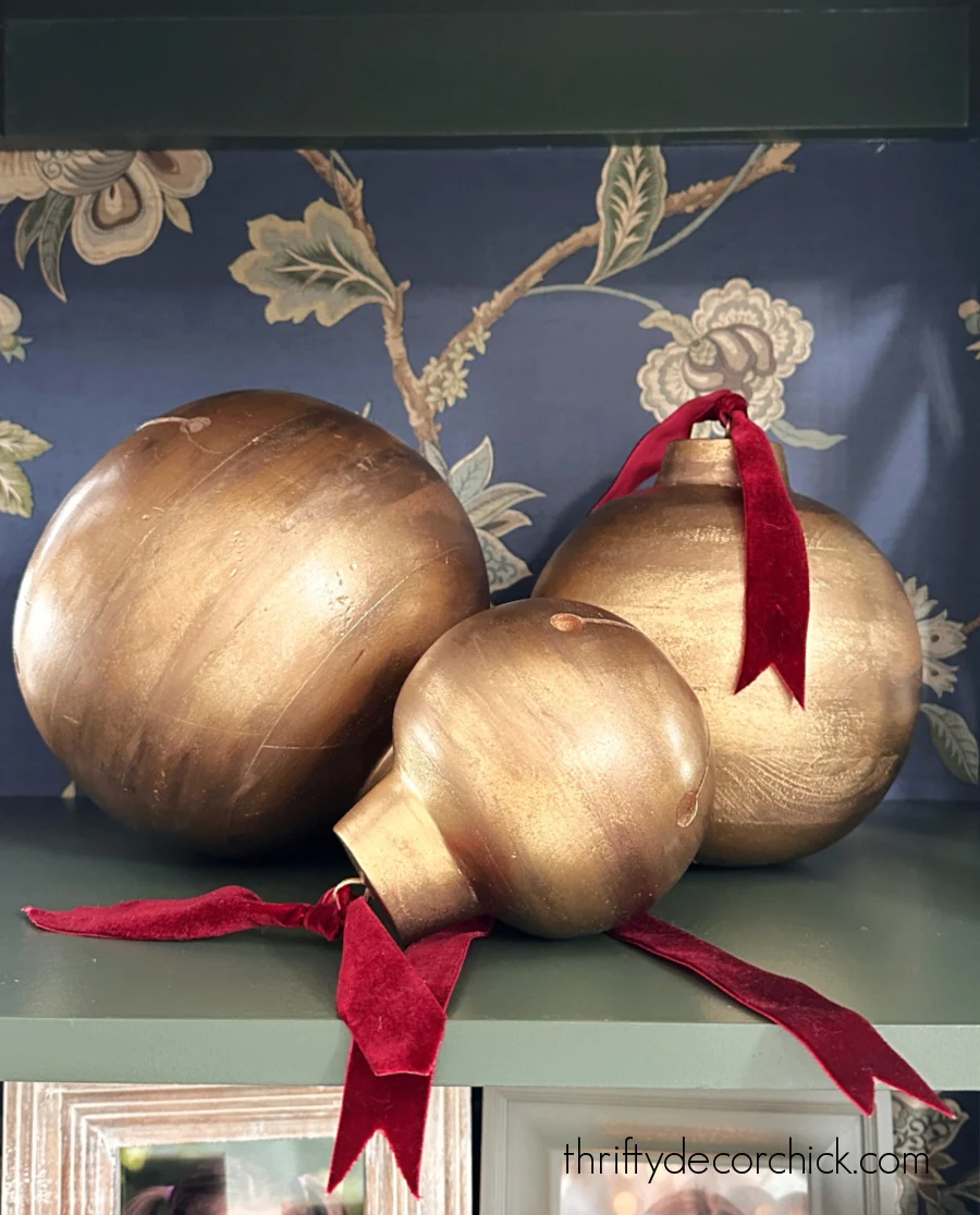 metal gold finish on wood bells