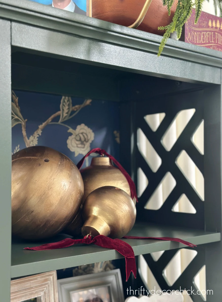 round christmas bells on shelf