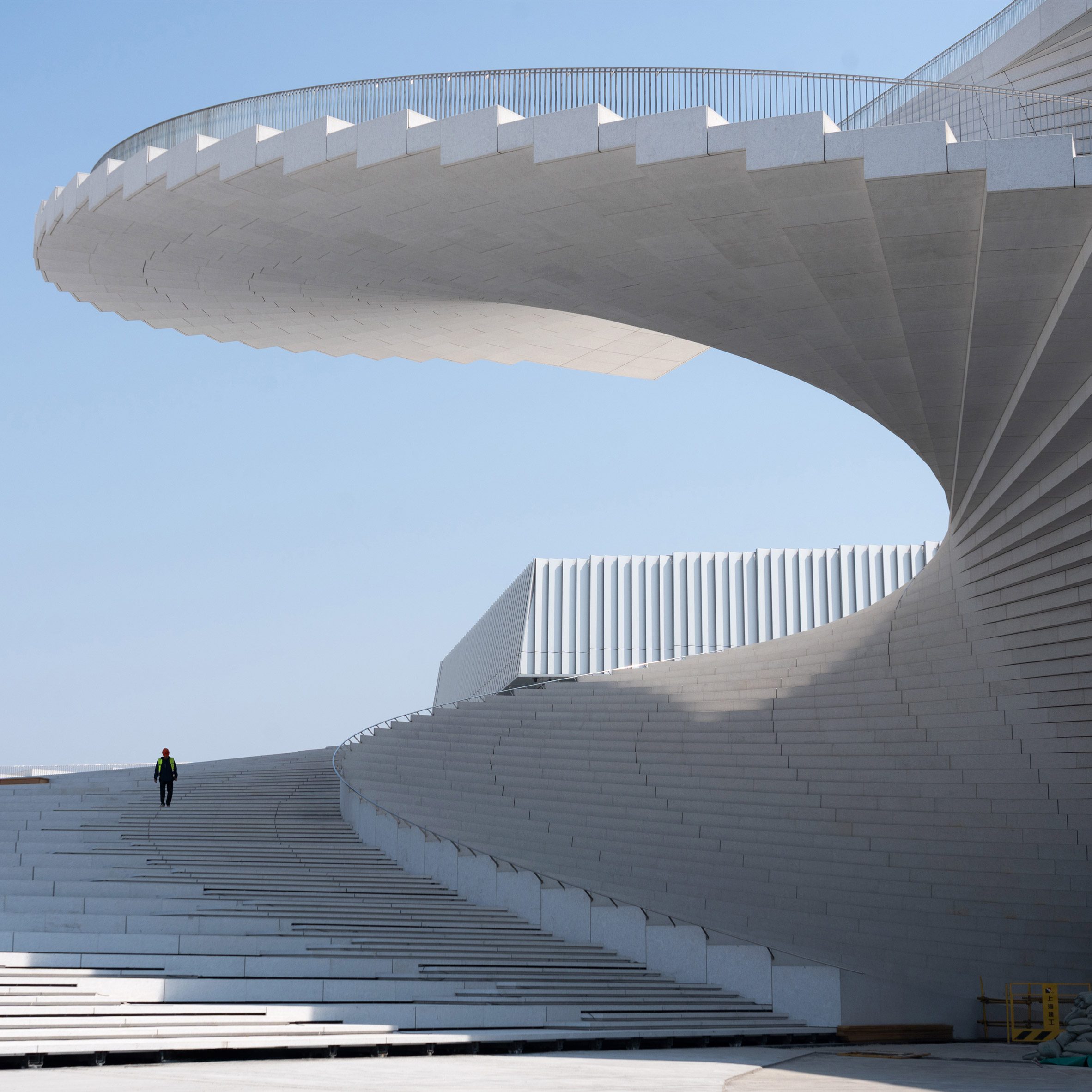 spiral staircase roof at the shanghai grand opera house by snøhetta