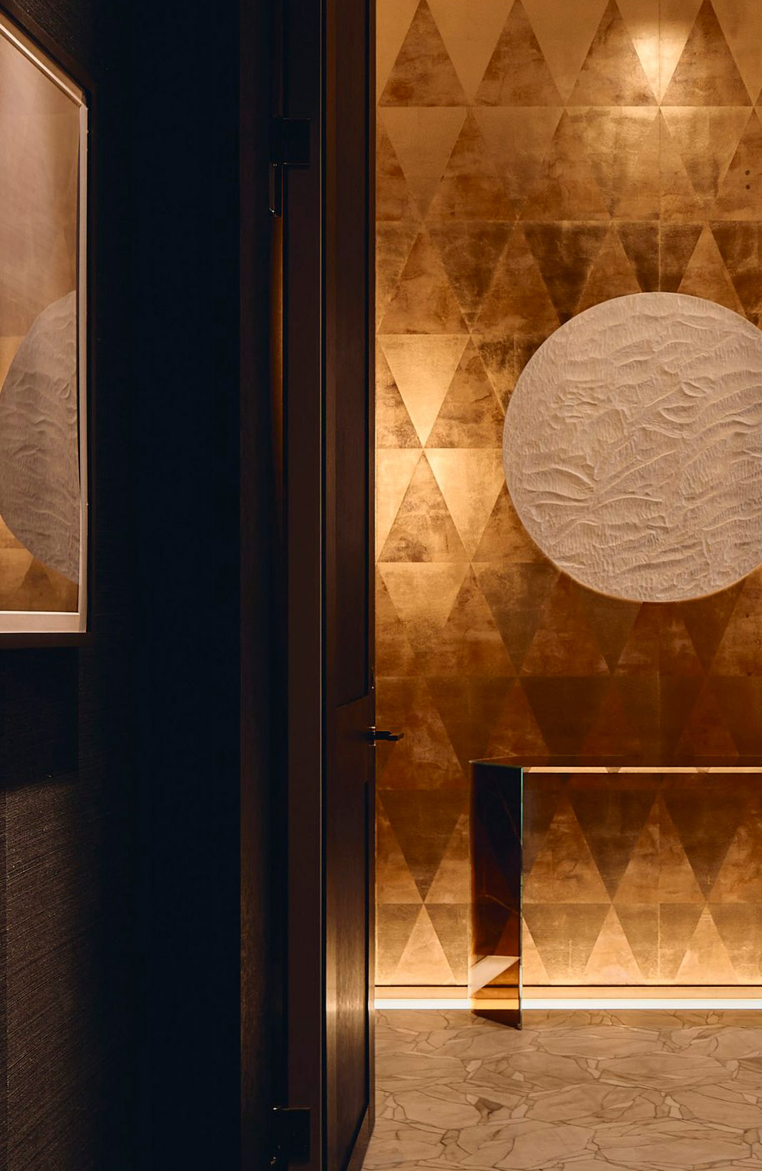 gilded wall panels in fairmont tokyo hotel by bar studio