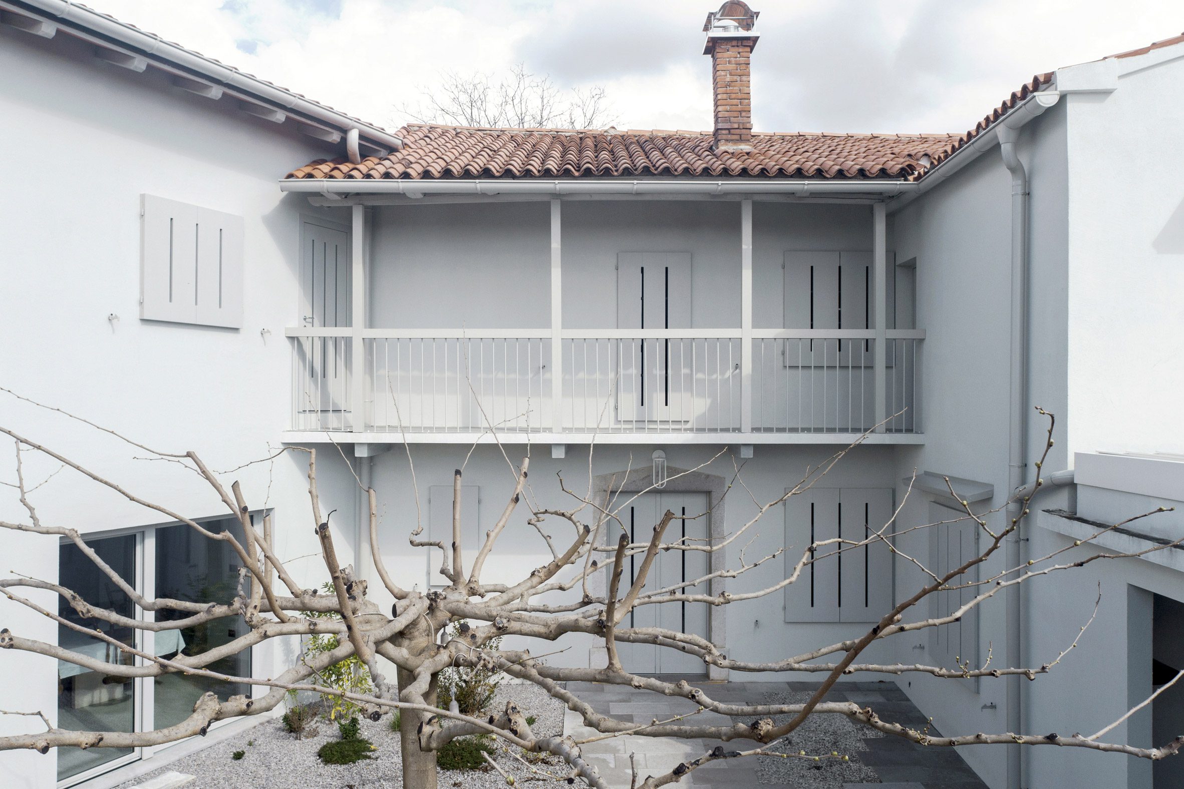 courtyard of the avber house by ofis arhitekti