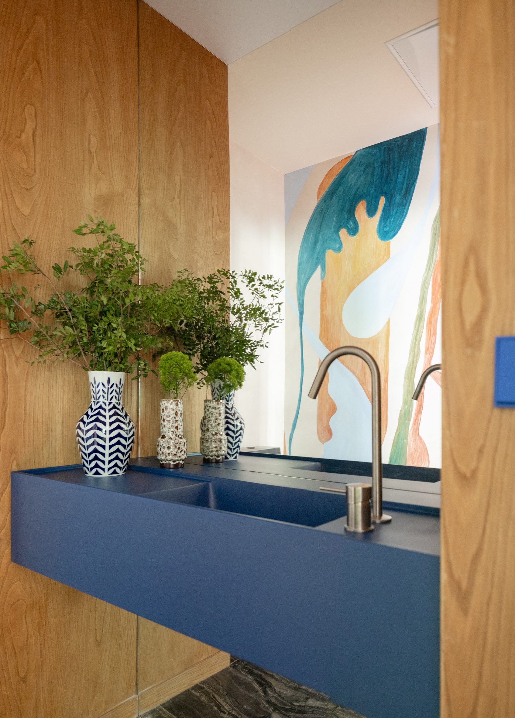 bathroom with blue sink in office in bilbao