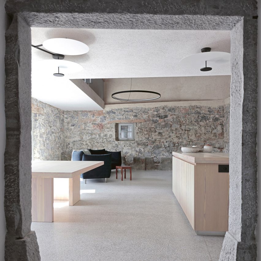 OFIS Arhitekti renovates stone house in Slovenia to feel "ancient and alive"