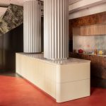 Tabula Studio combines bold red floors and trompe l'oeil details in Bilbao office