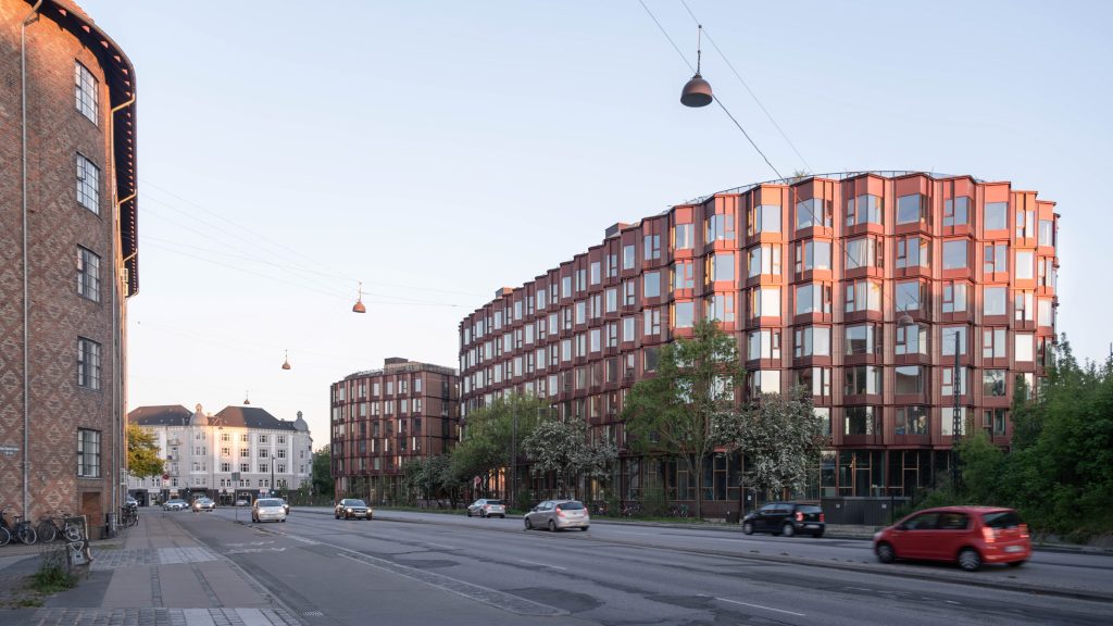 EFFEKT wraps student housing in Denmark with red accordion like facade