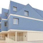 Office S M takes aim at generic suburbia with blue mews block in Kent Office S M takes aim at generic suburbia with blue mews block in Kent