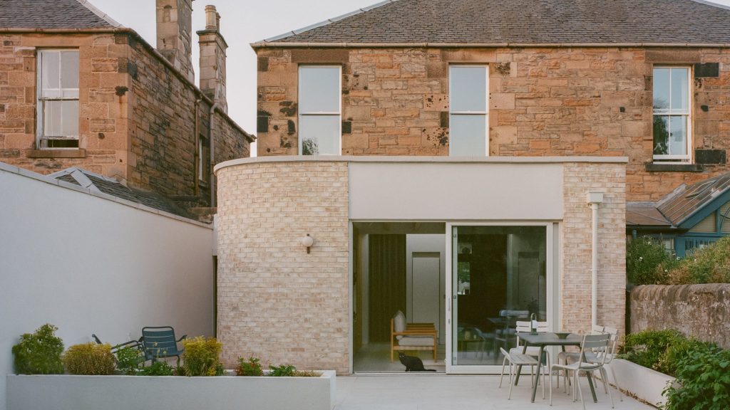 Pend adds curved brick extension to Victorian house in Edinburgh