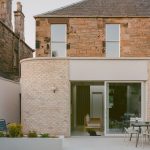 Pend adds curved brick extension to Victorian house in Edinburgh